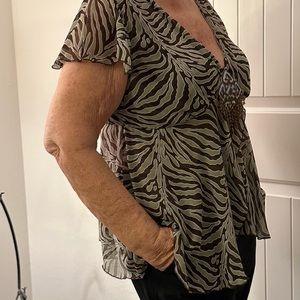 Blouse, brown with decorative emblem.  Size L/M